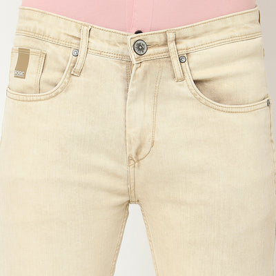 The Kolstad Jeans in Beige